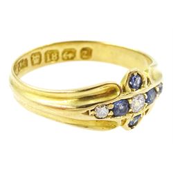 Victorian 18ct gold sapphire and diamond ring, three old cut and single cut diamonds, the principal diamond with four oval cut sapphire surround, to a ridged design shank, Birmingham 1899