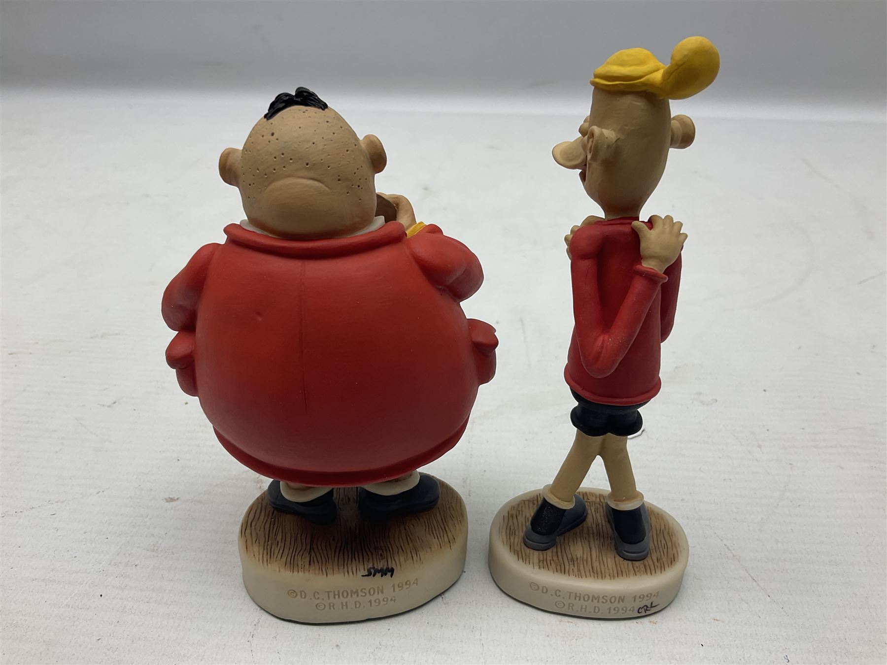 Thirteen Robert Harrop figures from the Beano Dandy collection, comprising Yo-Yo Collectors Piece 1996, Desperate Dan BD03, Cuthbert Cringeworthy BD08, Teach BD06, 'Erbert BD14, Toots BD12, Winston BD17, Fatty BD07, Dennis The Menace BD01, Dennis the Menace Fishing BD806, Sydney BD13, Wilfrid BD15 and Plug BD11