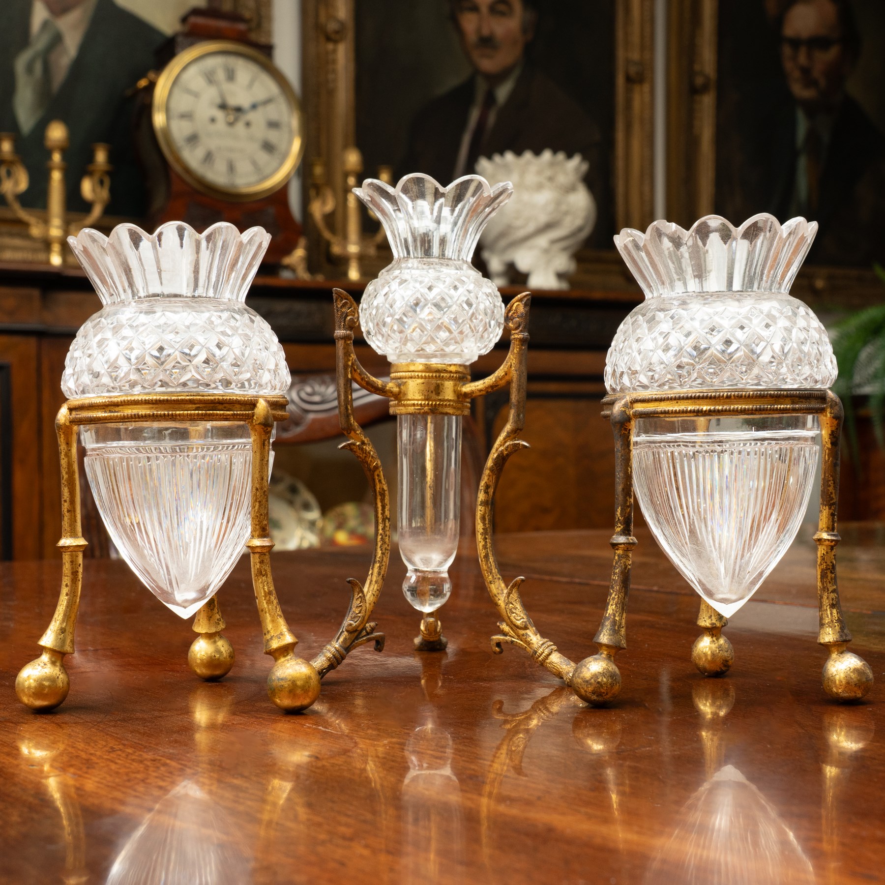 19th century F & C Osler trio, the cut-glass bud vases upon stylised gilt bronze mounts, stamped Osler to feet, tallest H15cm 
Notes: F & C Osler famously supplied the crystal fountain for the Great Exhibition of 1851.