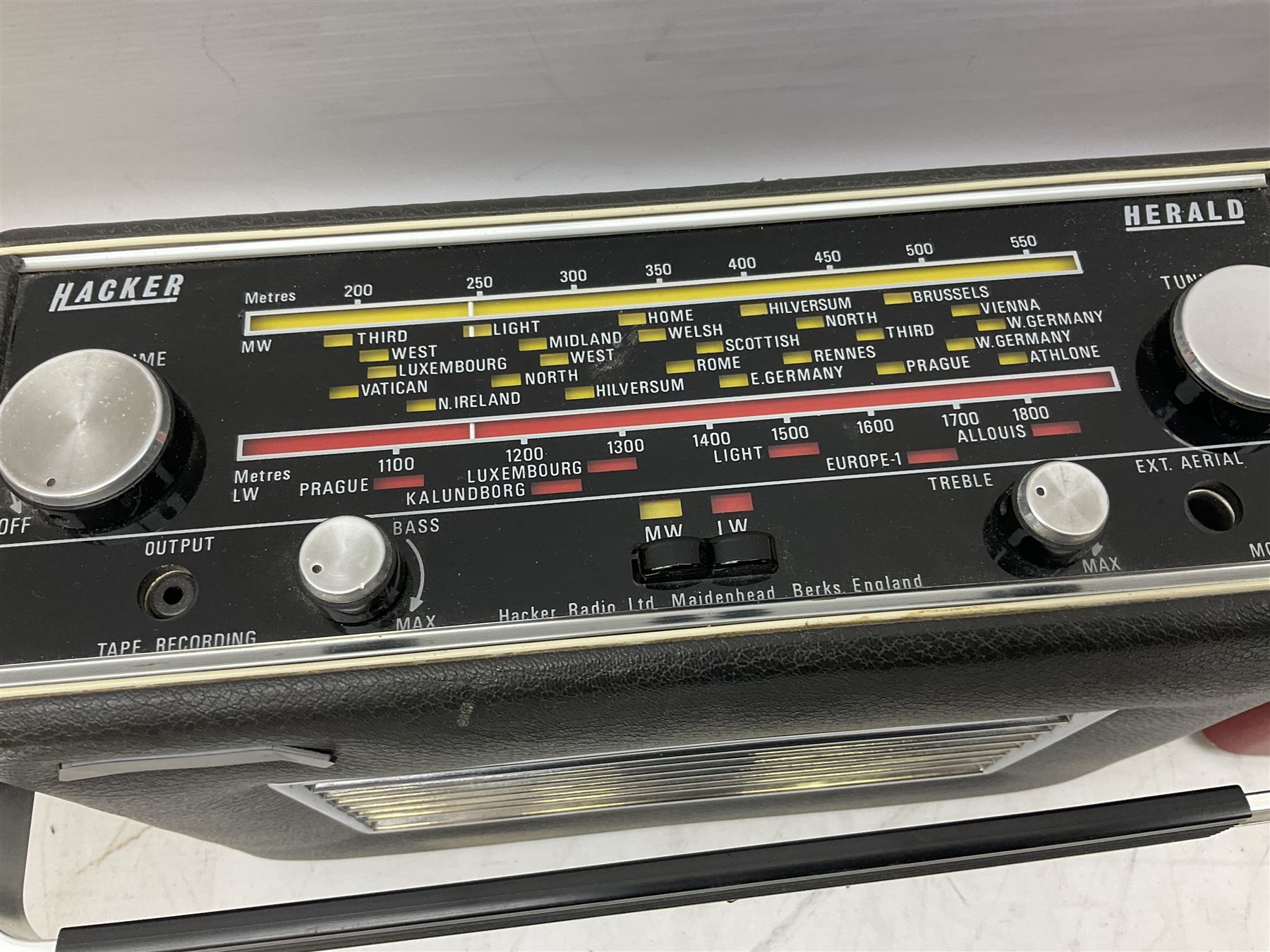 1950s Pye Type P43 cabinet radio in cream Bakelite case with orange knobs, W30cm H22cm D16cm, together with Ever Ready Sky Queen portable radio, Ekco portable radio in red case, Boxed Bush Special Edition 2002 Queens Golden Jubilee radio, Hacker Herald VHS radio (5)