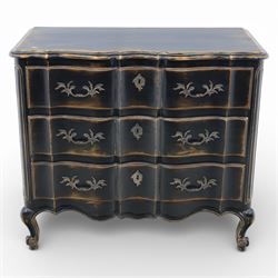 French style black lacquered chest of drawers, the serpentine front fitted with three graduated drawers mounted with scrolling foliate metal handles and key plates, shaped apron and scrolled cabriole legs