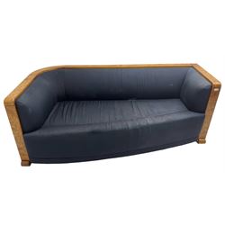 Thormer Polstermobel - Art Deco design three seat sofa, of curved tapering form, upholstered in midnight blue fabric, framed in figured burr elm