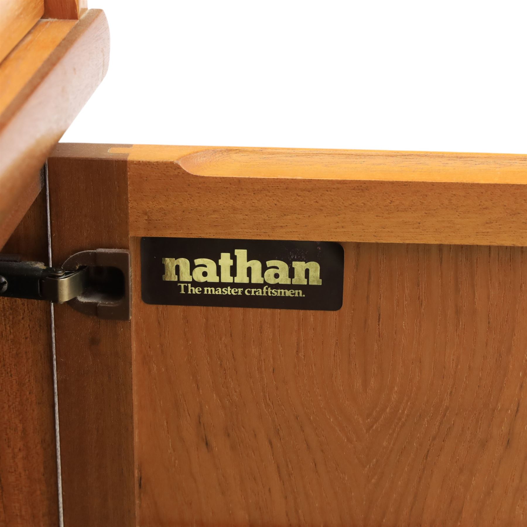 Nathan - 'Squares' pair of sideboards, rectangular top over four short drawers, above signature square panelled cabinet doors on a recessed plinth base