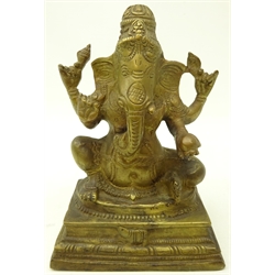  Early 20th century Indian brass figure of Ganesha, H19cm   