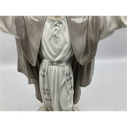 Lladro figure, The Loaves and Fishes, modelled as Jesus Christ with arms raised standing beside a basket of loaves and a basket of fish, sculpted by Salvador Furió, with original box, no 5896, year issued 1992, year retired 1997, H35cm