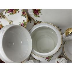 Royal Albert Old Country Roses pattern tea service for six, comprising teapot, sucrier, milk jug, dessert plates, one cake plate, one two tiered cake stand, salt and pepper pots and bud vase 