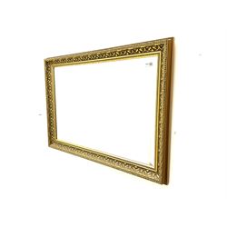 Rectangular ribbed gilt framed bevelled edge wall mirror and a rectangular wall mirror in swag frame