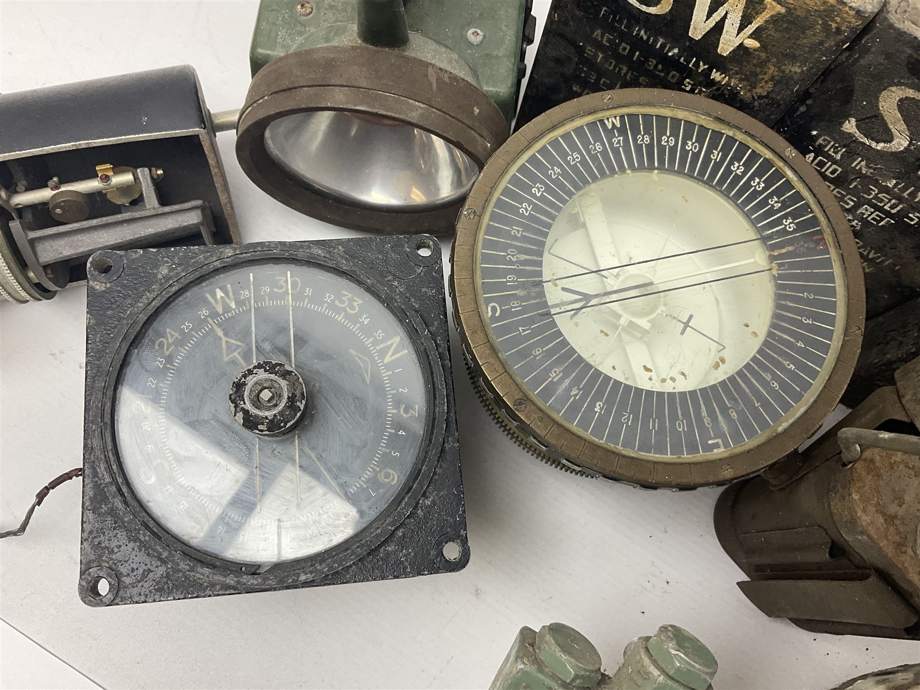 Three RAF light switches, together with military oxygen canister, batteries, gages etc  