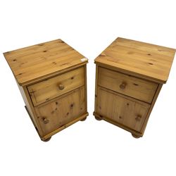 Pair of waxed pine bedside cabinets, fitted with single drawer over cupboard, on bun feet