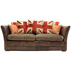 Large Knole design three-seat sofa upholstered in brown leather with scatter cushions upholstered in contrasting striped and Union Jack patterned fabric, on block feet (W210cm, H100cm, D102cm); together with matching rectangular footstool (135cm x 75cm, H45cm)