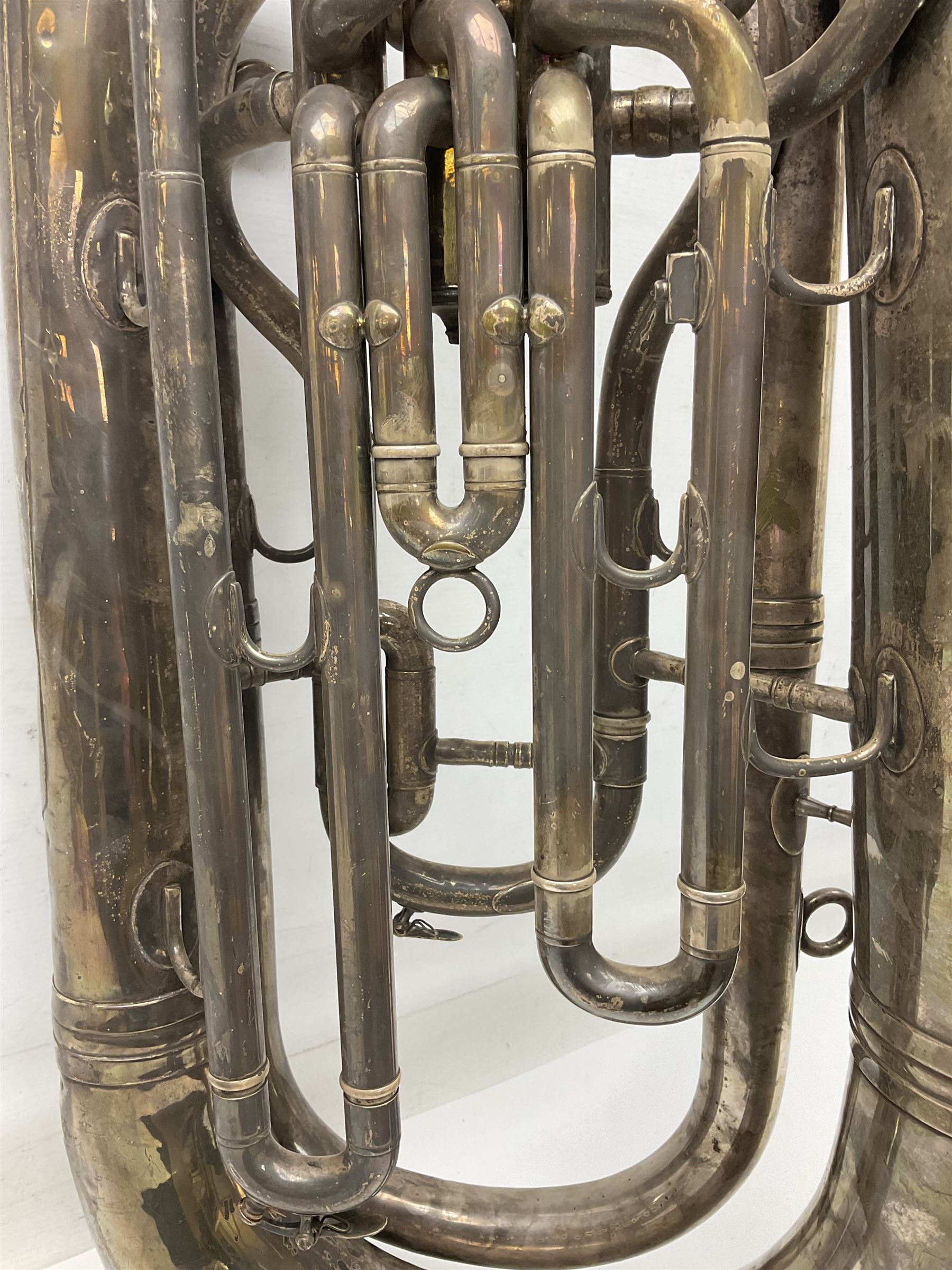 Boosey & Co silver plated 'Solbron' Class A Tuba c1920, serial number 102760, with compensating pistons and foliate engraved decoration H106cm 