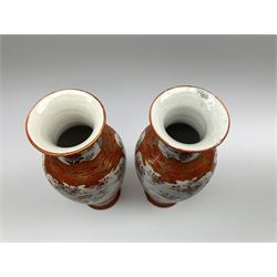 A pair of Japanese Kutani vases, of baluster form decorated with panels of birds and flowers, each with marks beneath, H30cm. 
