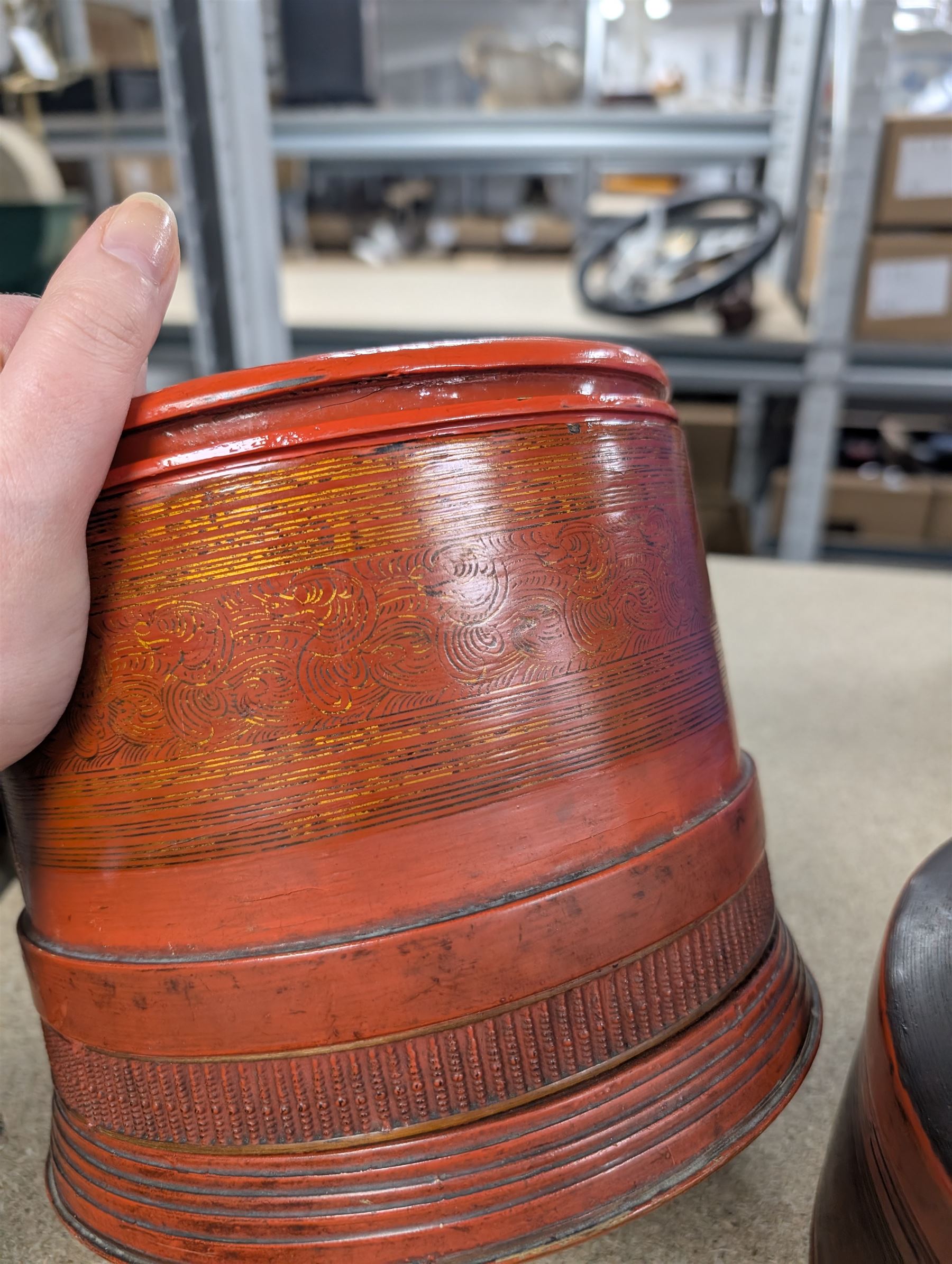 Burmese red lacquer circular box, pewter coffee pot, wooden book slide and circular photograph frames, thimbles including silver example, sampler and a small collection of vintage dolls house furniture