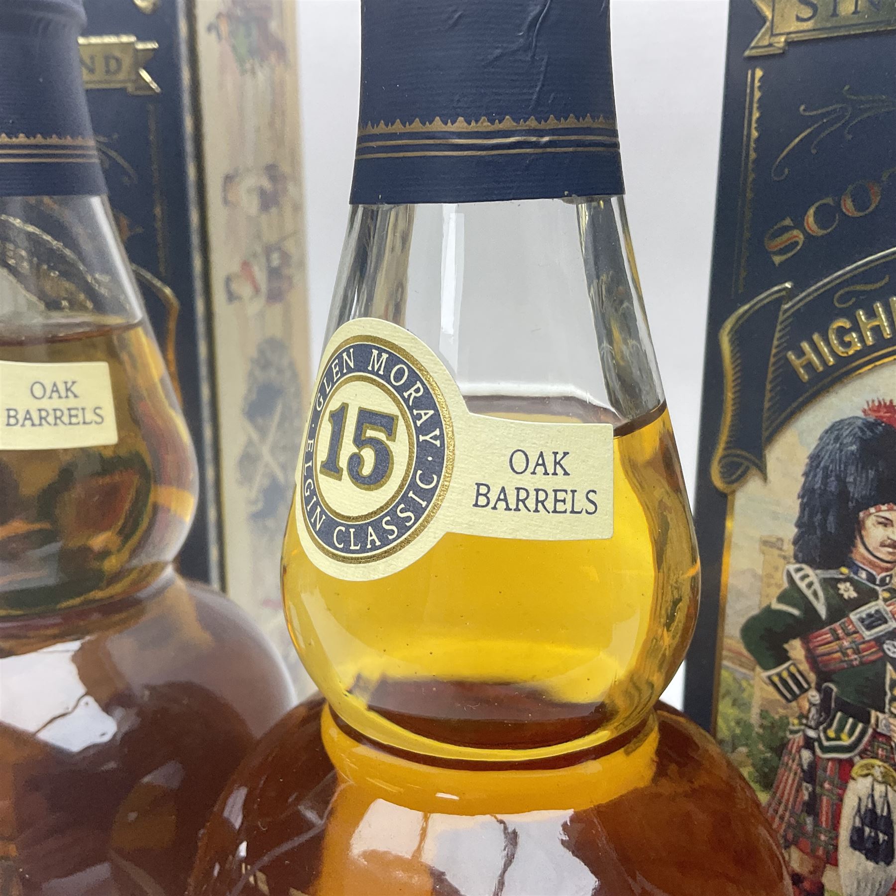 Two Glen Moray 15 year old Single Highland Malt Scotch Whisky, 70cl 43%, each in original Highland Regiments presentation tin 