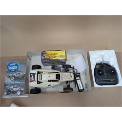 Tamiya 'The Grasshopper' 1:10 scale remote control car, boxed, together with an Acombs Techniplus-a controller, both boxed