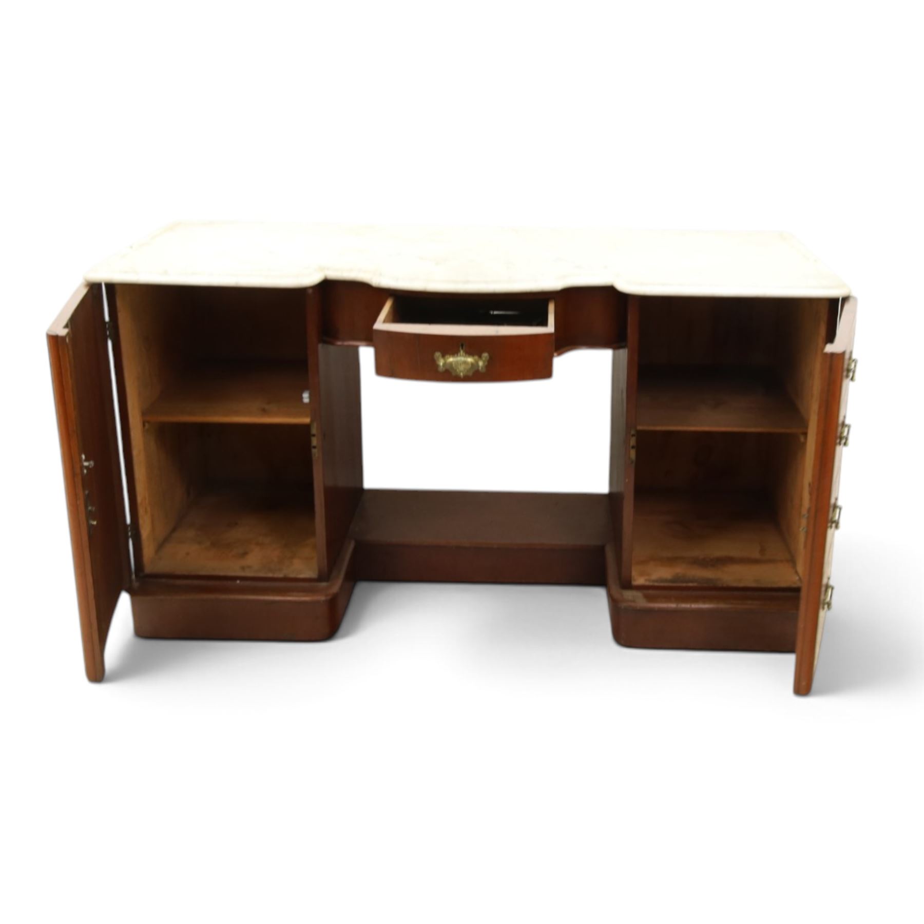 Victorian mahogany pedestal dressing table, shaped white marble top over central frieze drawer, flanked by two pedestal cupboards with four dummy drawer fronts and ornate brass handles, recessed kneehole with platform base, on plinth supports