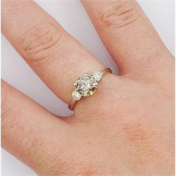 18ct white gold three stone round brilliant cut fancy champagne and white diamond ring, stamped 750, principle diamond approx 1.00 carat