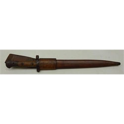  British WWll Bayonet, 30cm twin edge fullered bale stamped Wilkinson London, part wood grip, in leather sheath, mount stamped with arrow, frog stamped with Crown above E, L48cm  