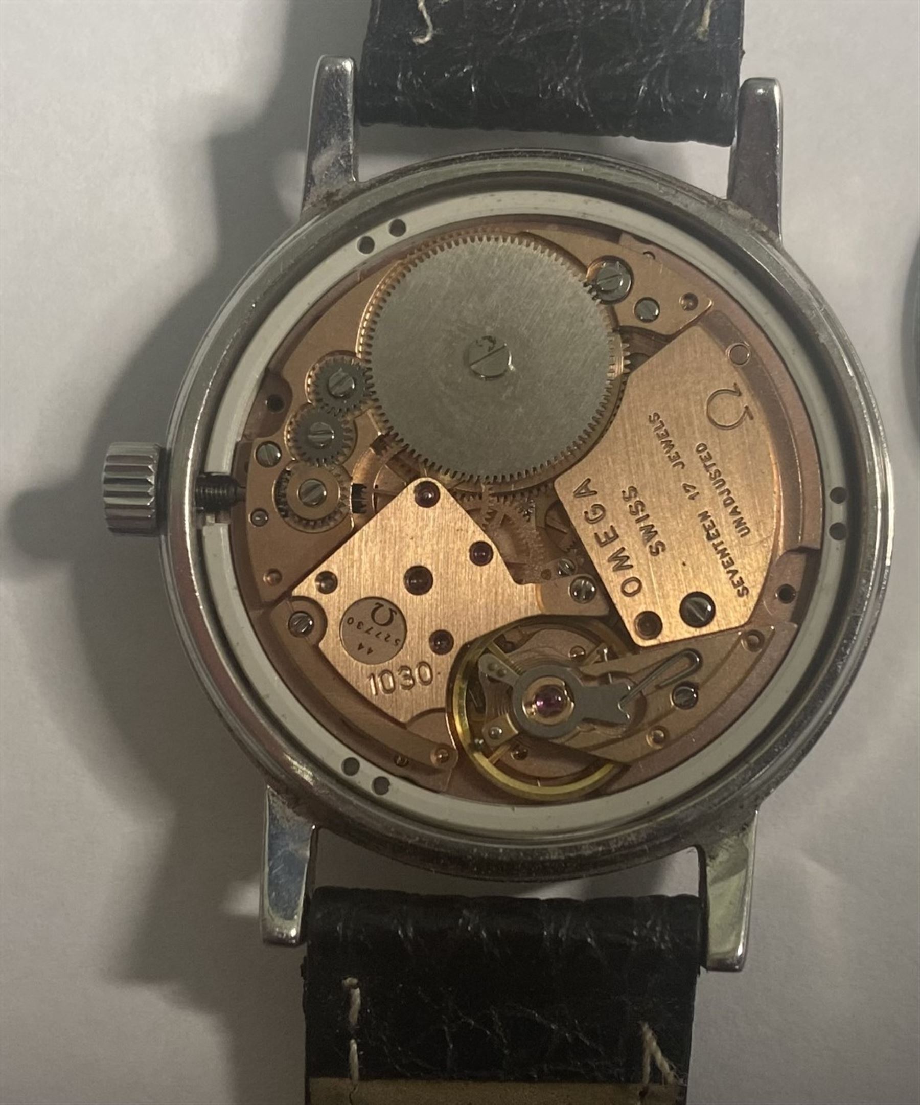 Omega gentleman's stainless steel manual wind wristwatch, calibre 1030, serial No. 44 527730, with date aperture, on black leather strap