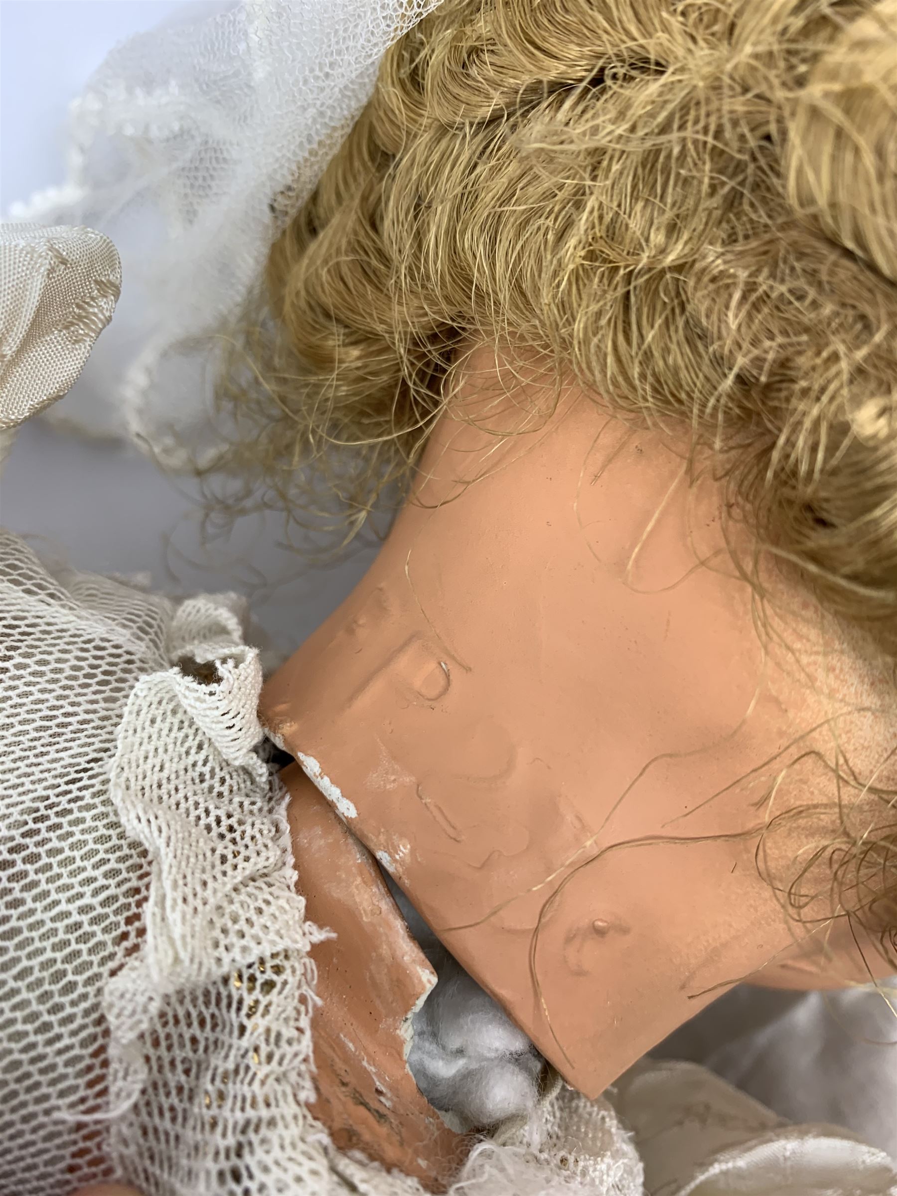 Seyfarth & Reinhardt composition head baby doll with moulded hair, sleeping flirty eyes, open mouth with one tooth and tongue and soft body with composition jointed limbs, marked 'SuR Germany 30/5' H47cm; together with a Golborne Dolls 'Golborne Beauty' composition head and body bride doll, marked 'F.P.23' in original box H63cm (2)