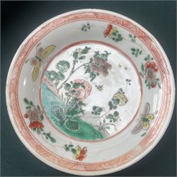 Three Chinese famille verte examples, approximately Yongzheng period, to include two teabowls and two saucers, each decorated with flowers and butterflies, two with sacred fungus mark within double rings, the teabowl with lotus mark, the other indistinct - possibly a Wan mark within lozenge (4)