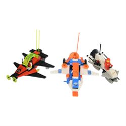 Eleven vintage Lego spaceships, comprising no. 6842 Shuttle Craft, no. 6879 Blizzard Baron, no. 6877 Vector Detector, no. 6880 Surface Explorer, no. 6852 Sonar Security, no. 897-1 Mobile Rocket Launcher, no. 6847 Space Dozer, no. 6834 Celestial Sled, no. 6846 Tri-Star Voyager, no. 6829 Radon Rover and no. 6815 Hovertron, all built with minifigures