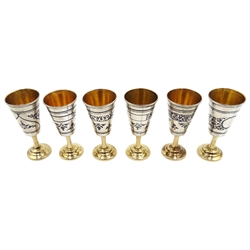  Set of six Russian niello silver and parcel gilt vodka cups, stamped 5KXK, approx 7.5oz  