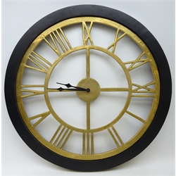  Two large battery operated wall hanging clocks, the dials with Roman numerals, D80cm and the smaller D70cm  