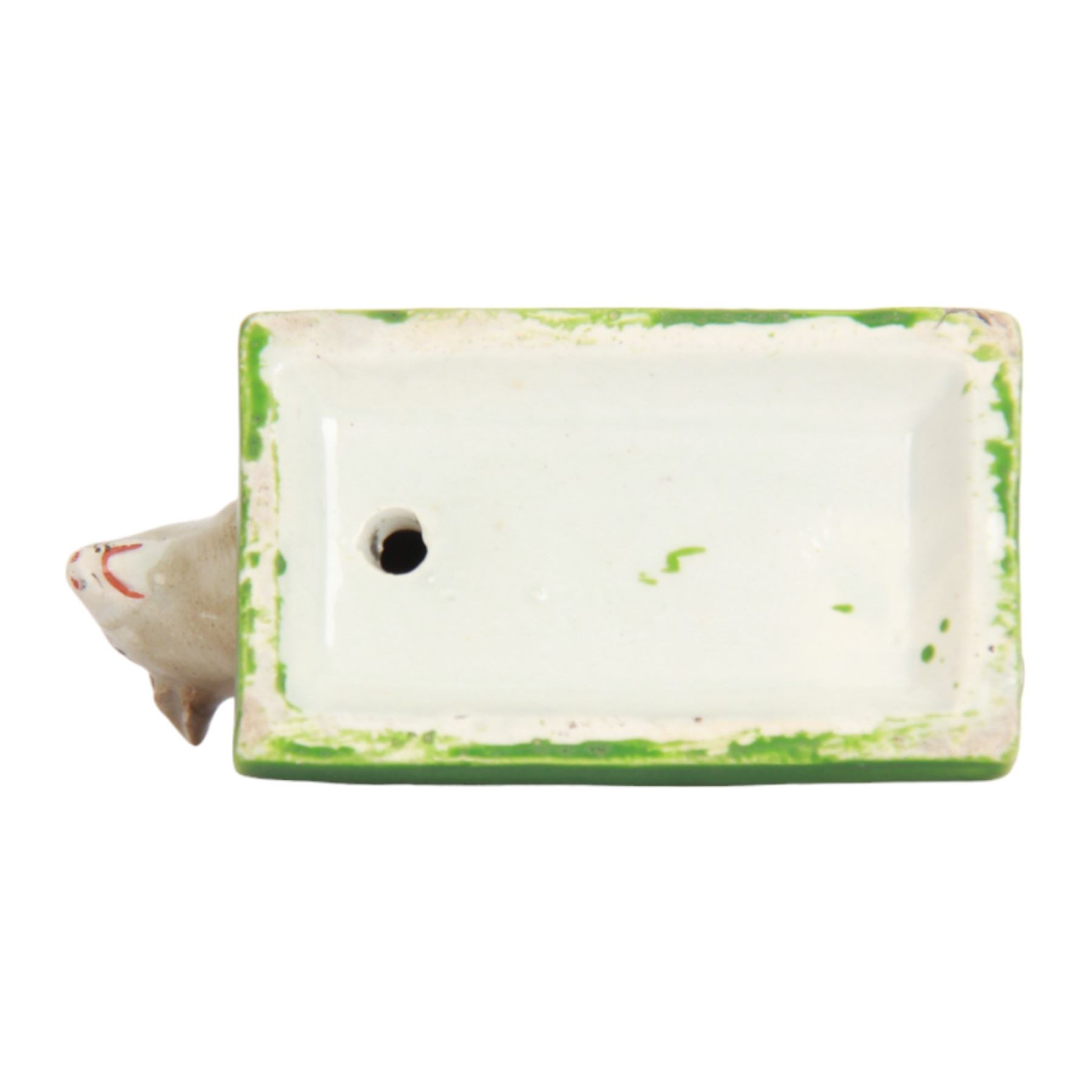 Pair of rare early 19th century Staffordshire pottery figures, circa 1820, modelled as mice resting upon green rectangular bases, H3.5cm L9cm

Footnote: Figures such as these are very rare, few examples have survived and are thought to have been played with as toys
