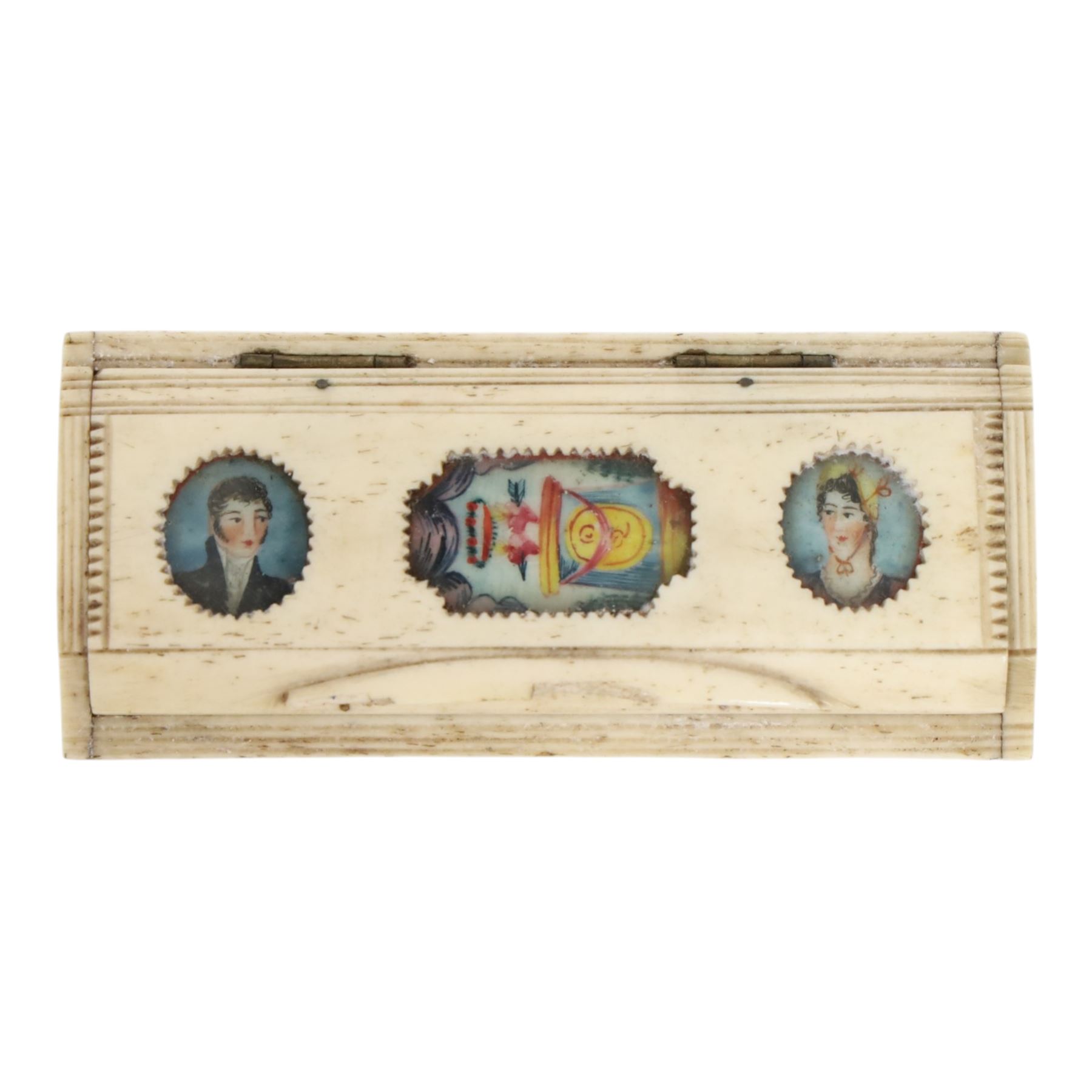 French Napoleonic Wars prisoner of war bone snuff box 1805-20, with coloured insets in the hinged lid depicting a man and woman facing each other with a central image of two hearts pierced with an arrow, H2cm, L9cm 