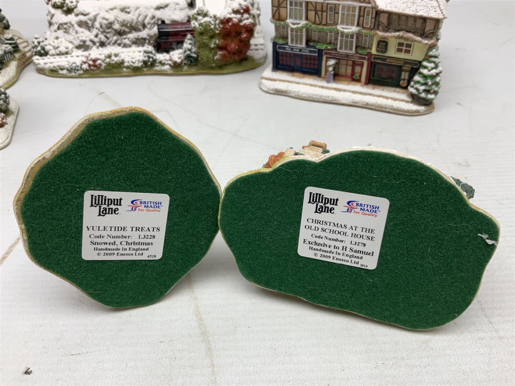 Five Lilliput Lane Illuminated Cottages, comprising Christmas is Coming, with box and deed, Christmas at Mol's, with box and deed, Christmas in Canterbury, with box and deed, Christmas Lights at Sweet Delights and The Three Kings, with box and deeds, together with twelve other Lilliput lanes, to include The First Noel, with box and deed, Winters Moonlight, Yuletide treats, with box and deed etc (17)