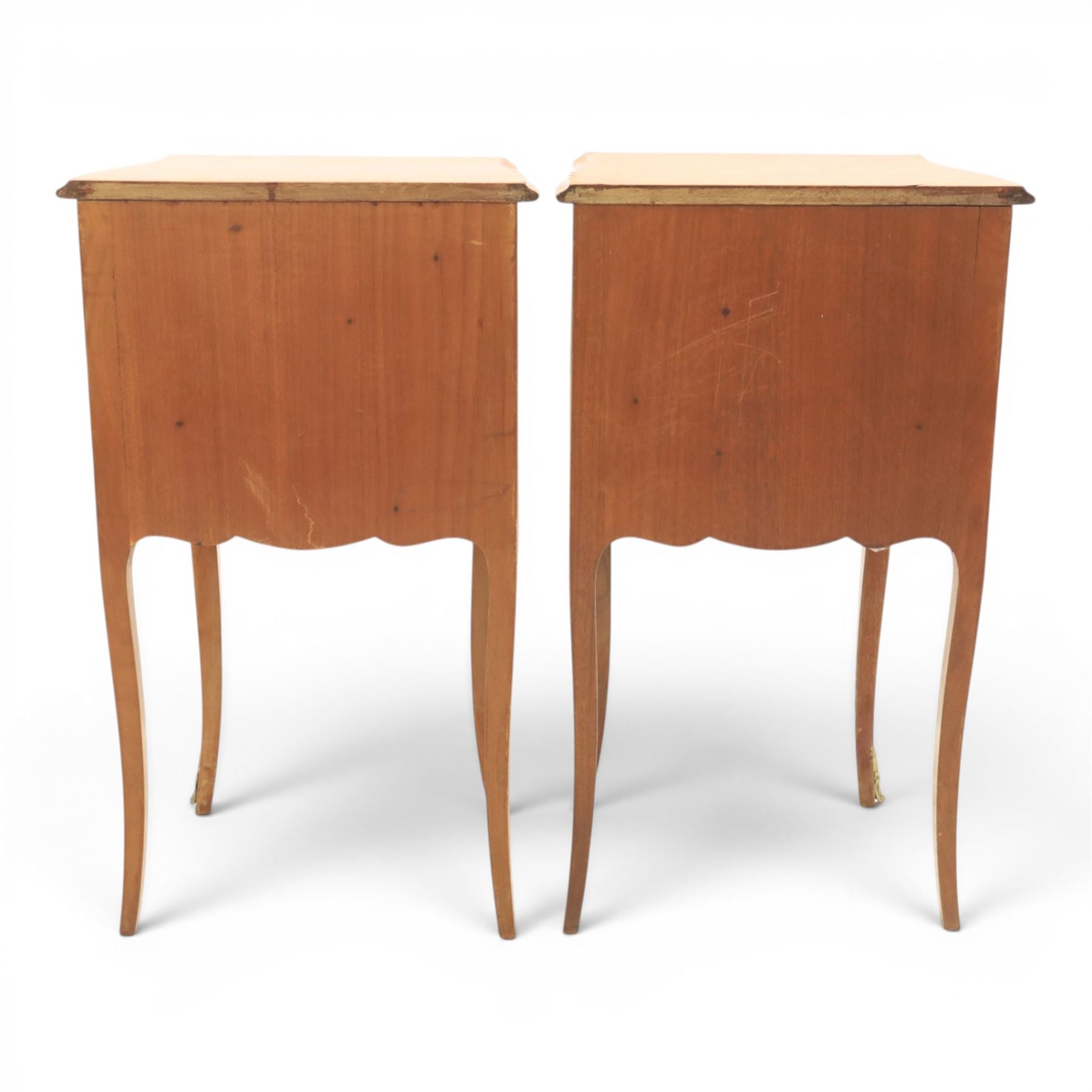 Louis XV style pair of kingwood bedside chests, each of serpentine outline with three parquetry drawers, gilt metal mounts and handles, raised on slender cabriole legs