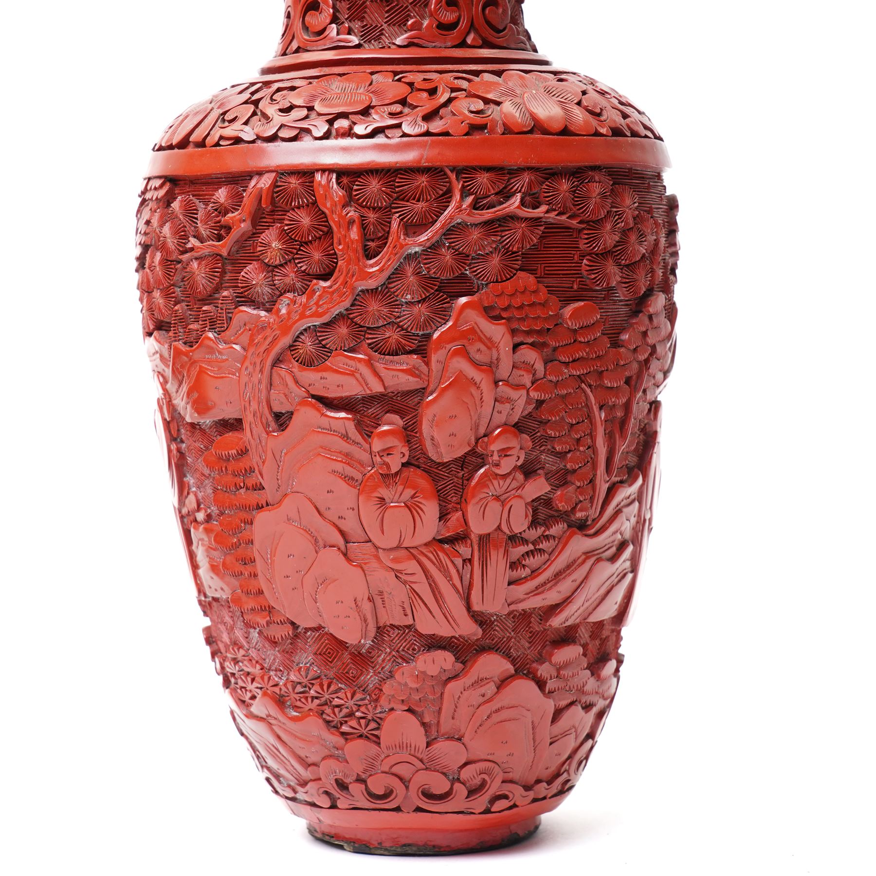 Pair of Chinese late Qing dynasty cinnabar lacquer vases, carved with scenes of figures in a landscape, H25cm (2)
