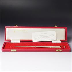 Pair of Edwardian silver candlesticks H16cm Chester 1908 Maker S Blanckensee & Son Ltd and a silver meat skewer/ paper knife, cased Sheffield 1977 Maker Cooper Bros