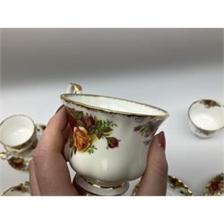 Royal Albert Old Country Roses pattern tea set, comprising teapot, coffee pot, six teacups and six saucers, five side plates, further teacup with joined saucer and side plate, open sucrier, milk jug, cake plate, and preserve pot and cover, together with Royal Albert Jubilee Rose pattern sauce boat and stand, and Royal Albert Lavender Rose pattern cake stand. 