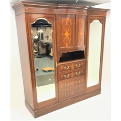  Edwardian inlaid mahogany break-front wardrobe, two doors above four graduating drawers flanked by two full length mirrored doors enclosing hanging rail and hooks, plinth base, W207cm, H216cm, D66cm  