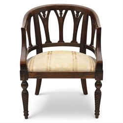 Late 20th century mahogany tub armchair, curved open back with pierced splat supports beneath a rounded top rail, upholstered drop-in seat in patterned fabric, raised on turned and ringed supports