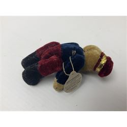 Group of five teddy bears comprising ‘George’ a unique pellet filled bear with glass eyes and velvet paws H38cm, and ‘Abbey’ a luxury German plush with wobble head and glass eyes no.5/10 H24cm, both with Teddies from Bearyland labels; along with two light blonde mohair H. M. Bears and Boyds Bears ‘T. F. Wuzzies’ no. 595140 (5)