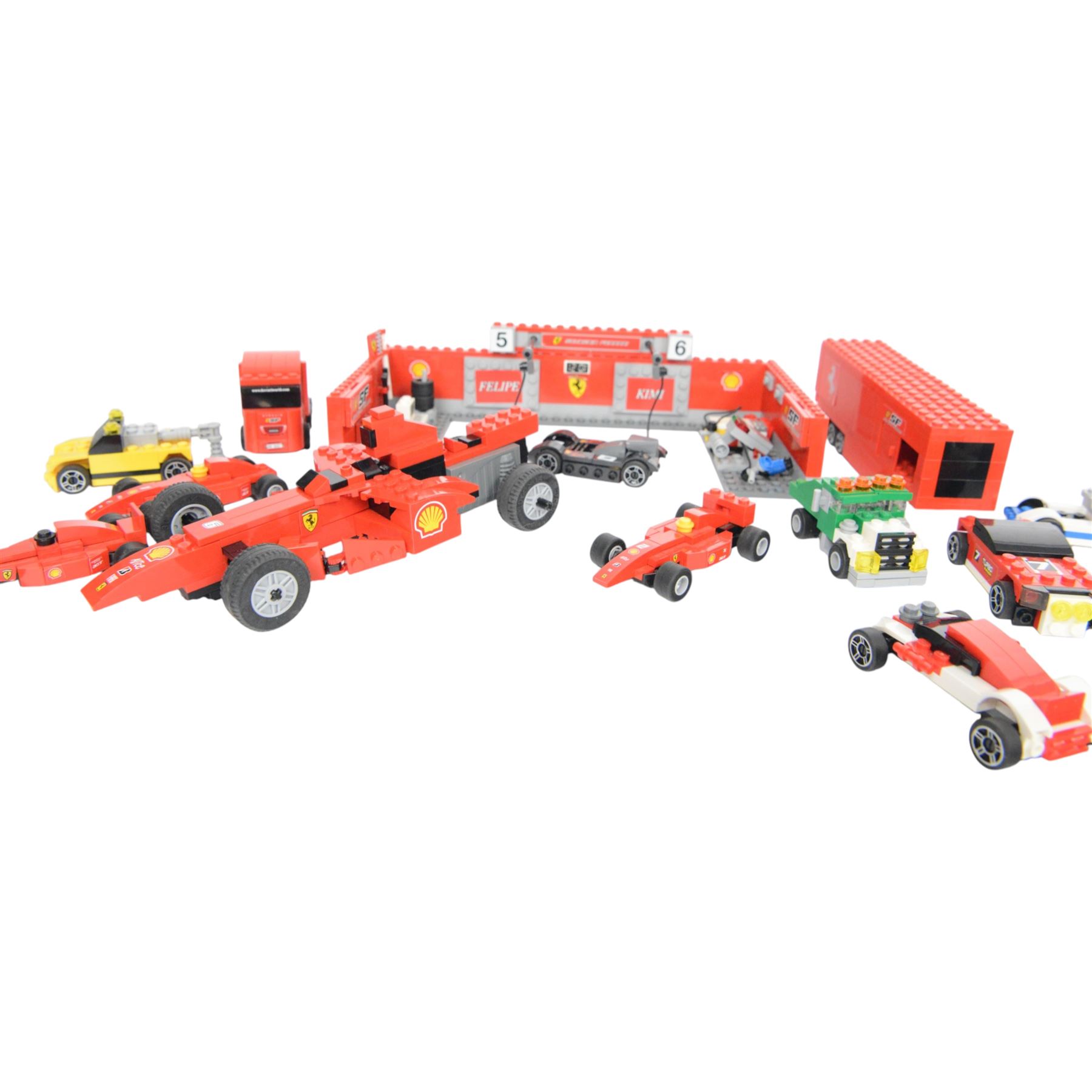 Lego Racers set Ferrari F1 Pit no. 8155, further racing related Lego pieces, all partially built, unboxed with instructions