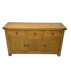 Oak Furnitureland, golden oak sideboard. Three single draws, three cupboard doors with single shelf
