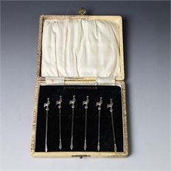 Set of six silver cocktail sticks, each with cockerel finials, stamped Sterling Silver, in...