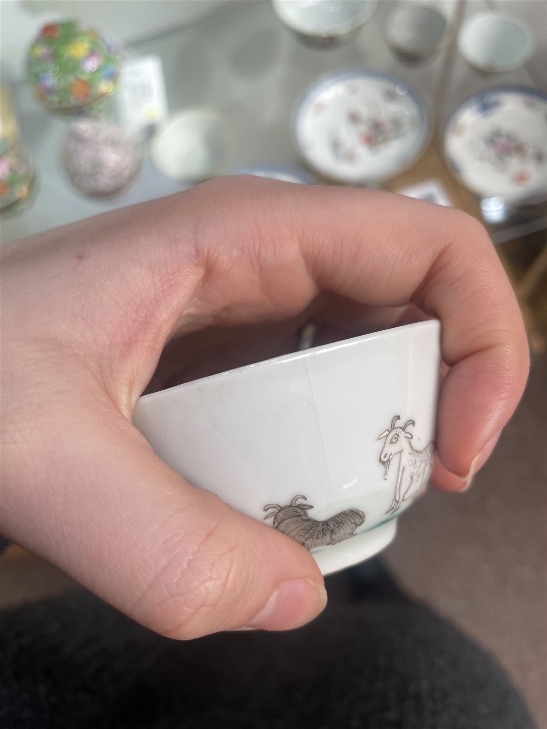 Group of eight 18th century and later Chinese famille rose and similar painted teabowls and dishes, to include unmarked peony cup, small cup decorated with flowers and butterfly, cup decorated with female figure gazing out of a window in a Buddhist temple with indistinct square character mark to base, pair of saucers unmarked, and others with character scenes unmarked (8)