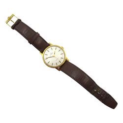 Omega Geneve gentleman's gold-plated manual wind wristwatch, on original brown leather strap