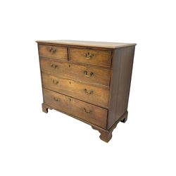 George III mahogany chest, rectangular top over two short and three long drawers with brass handles, on bracket feet