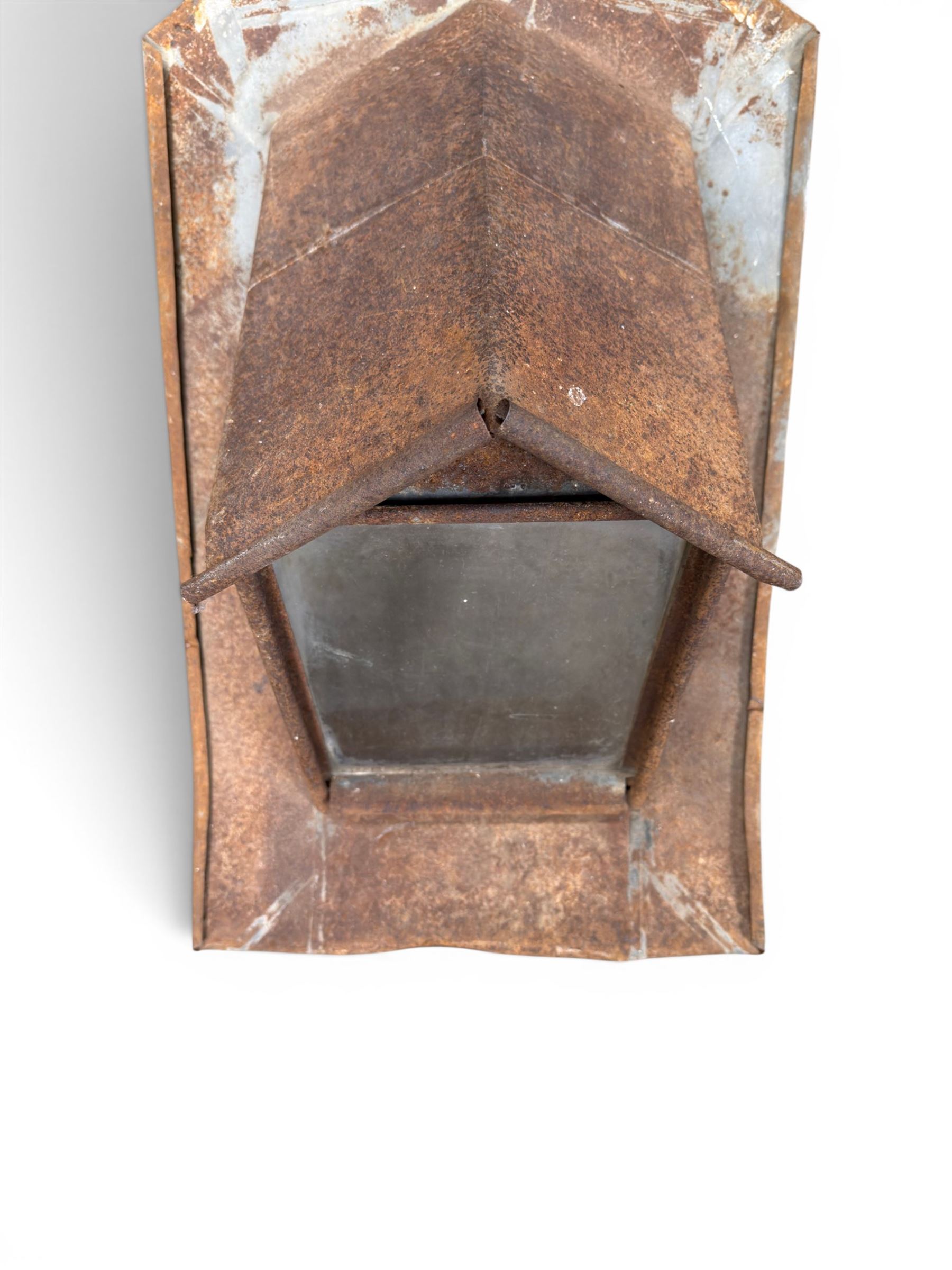 Pair of metal sloping roof lanterns with glazed windows