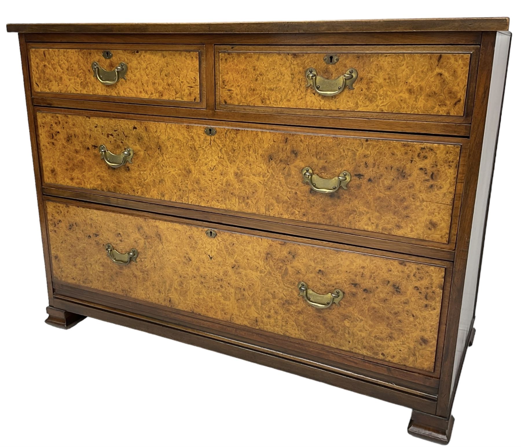 Late Victorian walnut straight-front chest, fitted with two short over two long figured drawers, on ogee rectangular feet