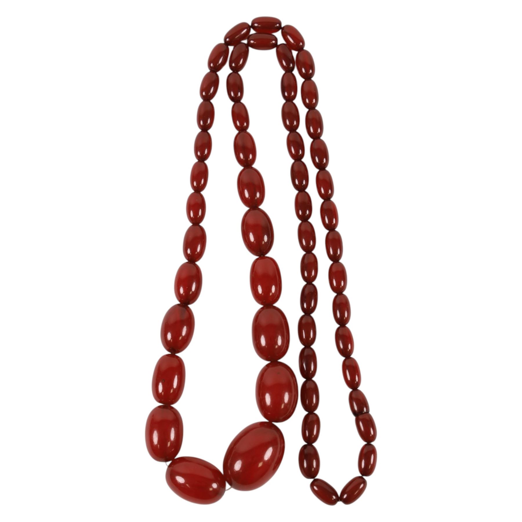 Cherry amber style beaded necklace and a gold plated seal fob