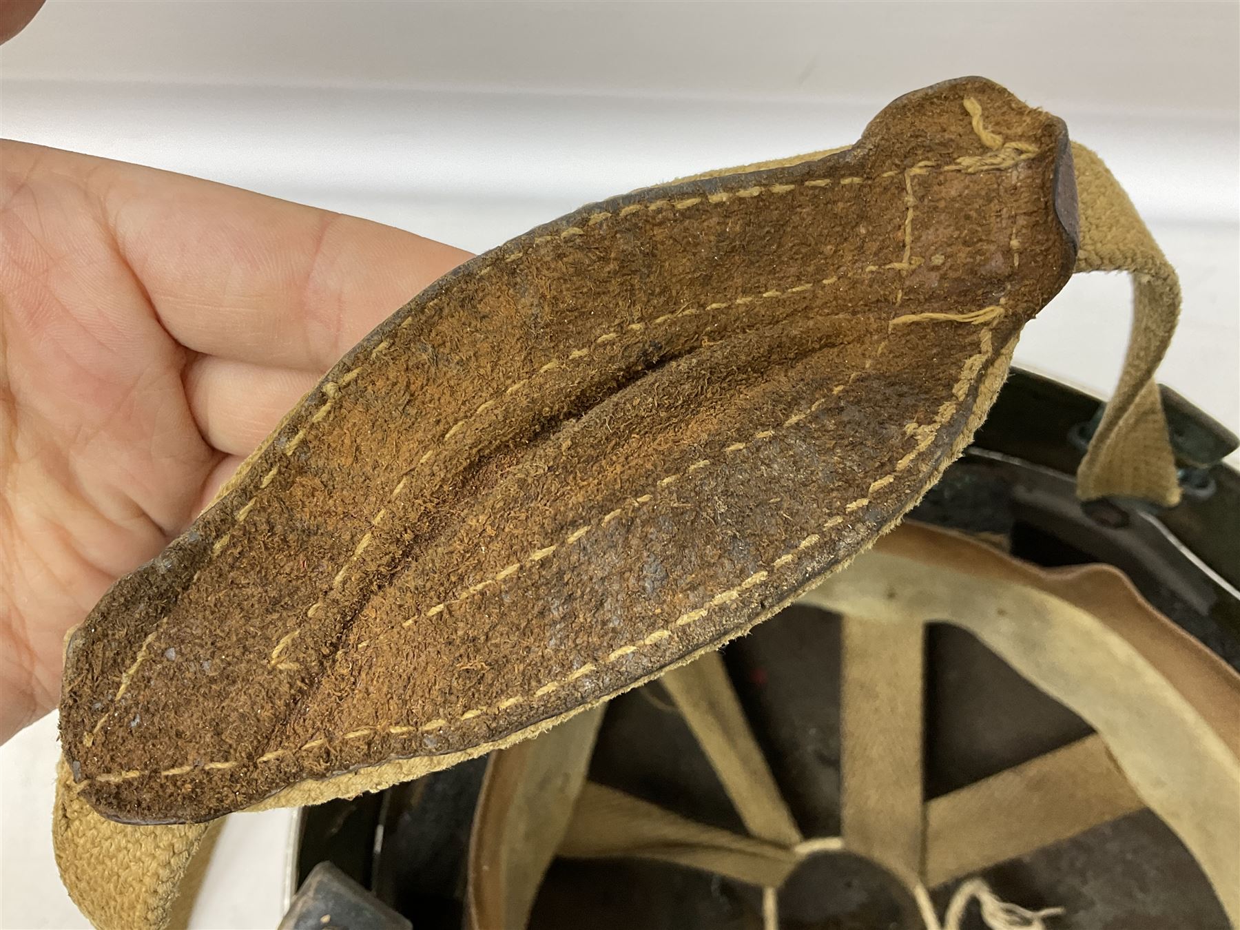 Post-WW2 British Airborne Troops,/Paratroopers Steel Helmet with green textured paint finish, leather and sponge liner and three point chinstrap mounting; liner marked BMB II 1953 71/4