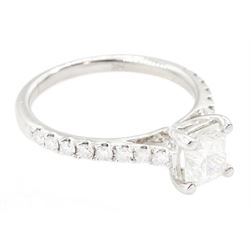 18ct white gold diamond ring, set with a single cushion cut diamond of 1.01 carat, with round brilliant cut diamond shoulders, hallmarked, with International Gemological Institute Report