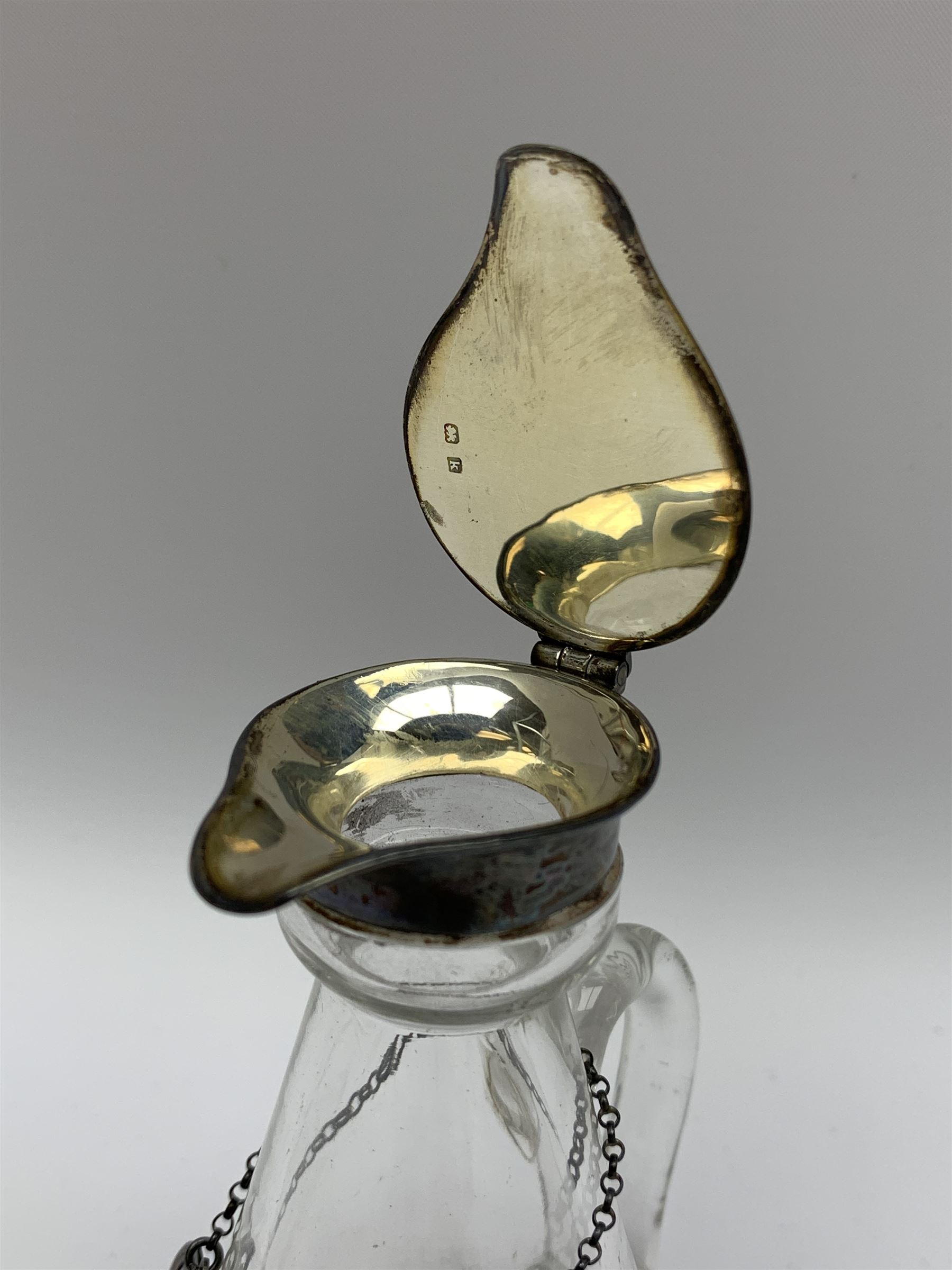 Edwardian silver mounted whisky noggin, of tapering cylindrical form with hinged flat cover, H11cm, together with a silver whisky label, each hallmarked Levi & Salaman, Birmingham 1909